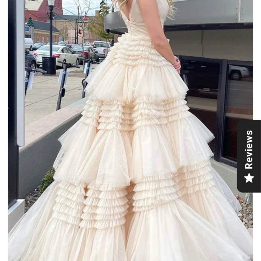 Elegant Cream Tiered Gown